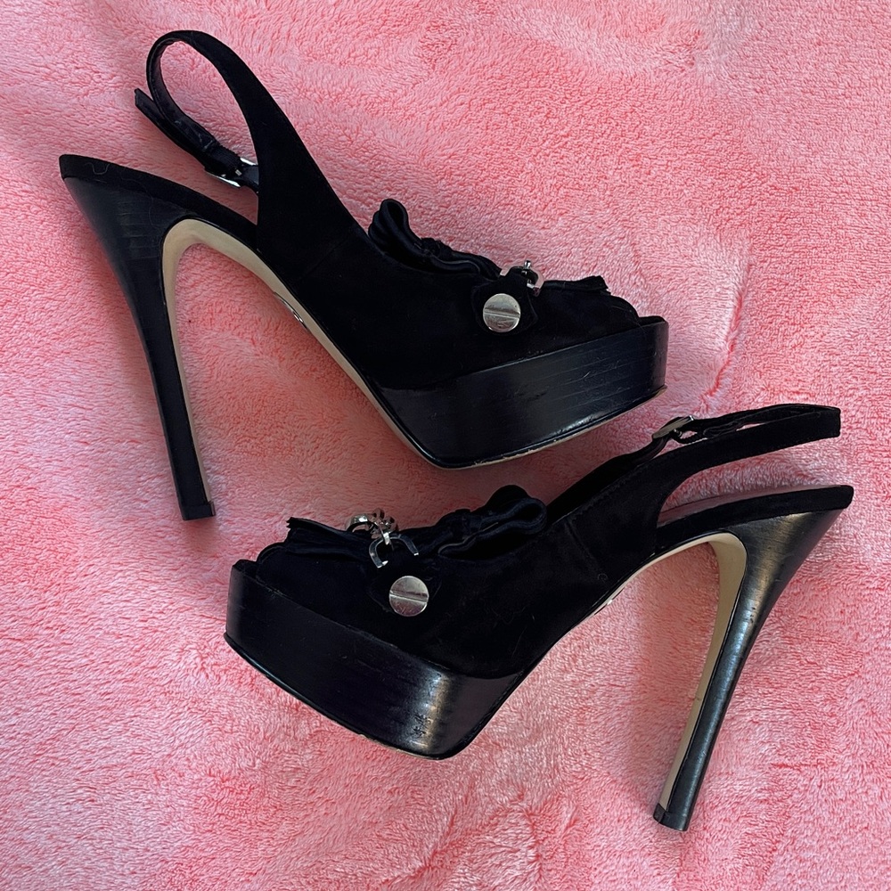 Black Shoes, BEBE Sling back High Heels with Chain and Fringe Detail.
Leather